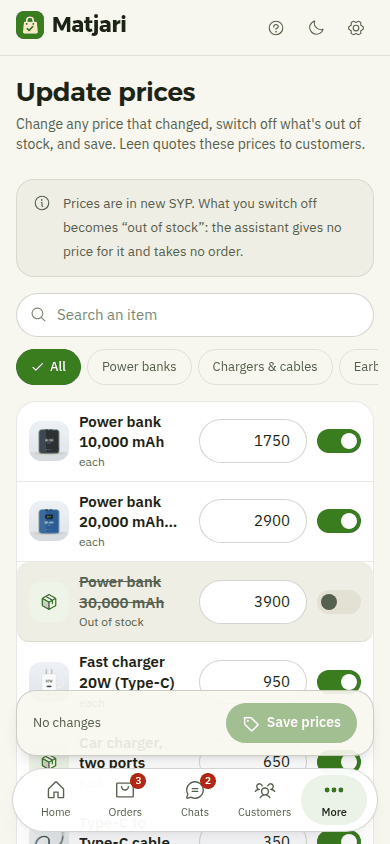 The Update prices page on a phone: each product with its price and an in-stock switch, and a save button